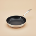 Pro Non-Stick Frying Pan 12 inch on warm beige background